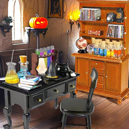 Witchy dollhouse miniature potion table with cauldron items, broom, and nearby bookcase