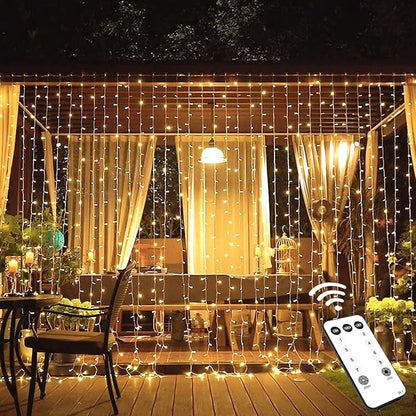 Warm white LED curtain string lights with hanging strands and remote control for outdoor decor