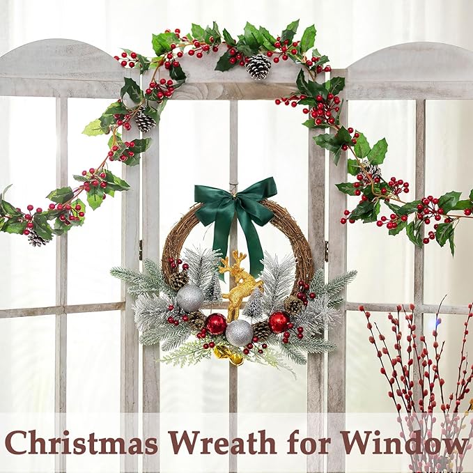 Lighted Christmas wreath with teal bow, gold reindeer, red berries, and silver ornaments