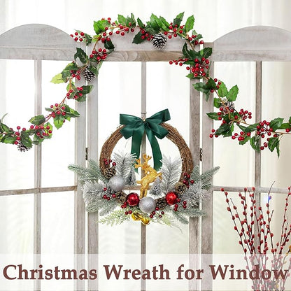 Lighted Christmas wreath with teal bow, gold reindeer, red berries, and silver ornaments