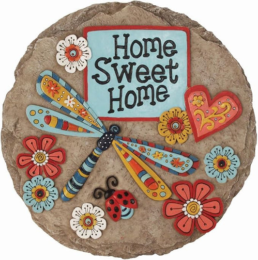 Garden stepping stone with “Home Sweet Home” text and colorful floral and dragonfly design