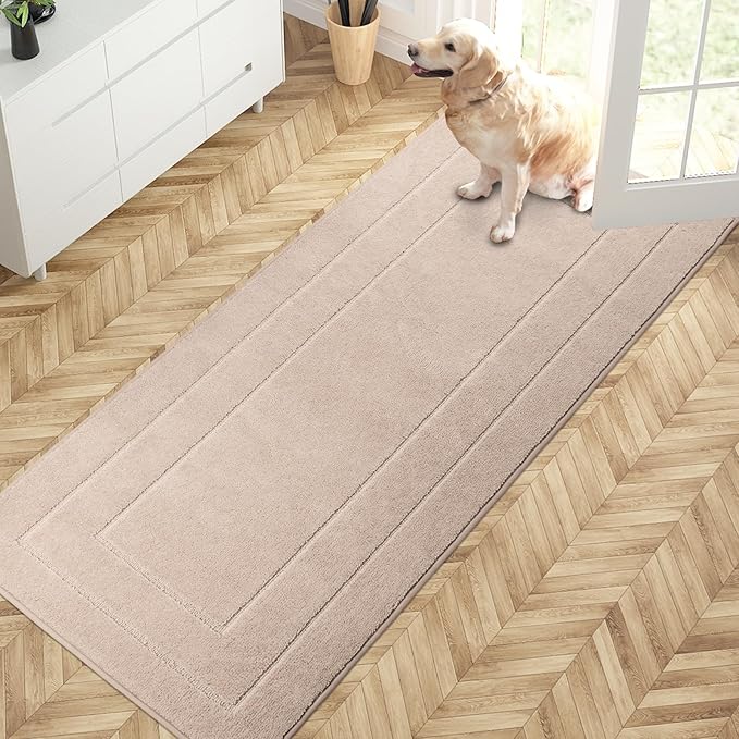 Beige entryway runner rug with low-pile texture and stitched edges for daily use.