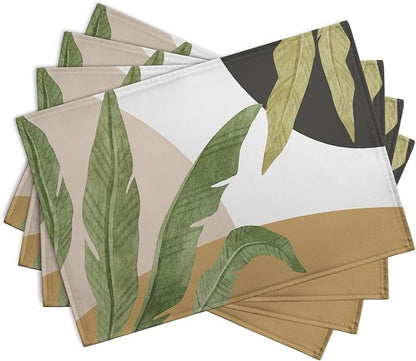 Set of 4 tropical leaf printed placemats, green banana leaves on white with tan border
