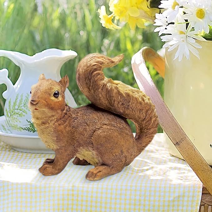 Brown squirrel statue with a large curled tail, shown at garden table scale