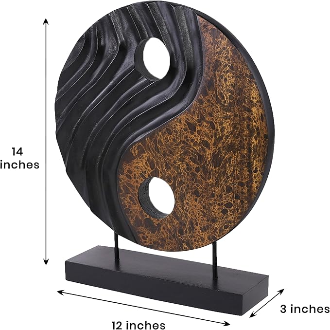 Yin yang wood sculpture with dark base; measures about 12 in wide and 14 in tall