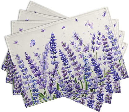 Set of 4 placemats stacked, showing purple lavender and butterfly print on ivory.