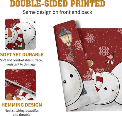Four-pack red double-sided printed snowman and snowflake placemats in product graphic