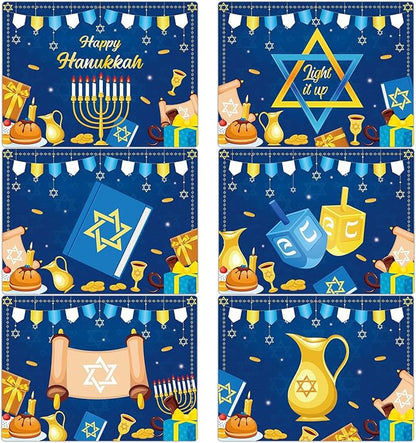 Set of 6 blue plastic Hanukkah placemats with menorah, stars, and dreidel icons