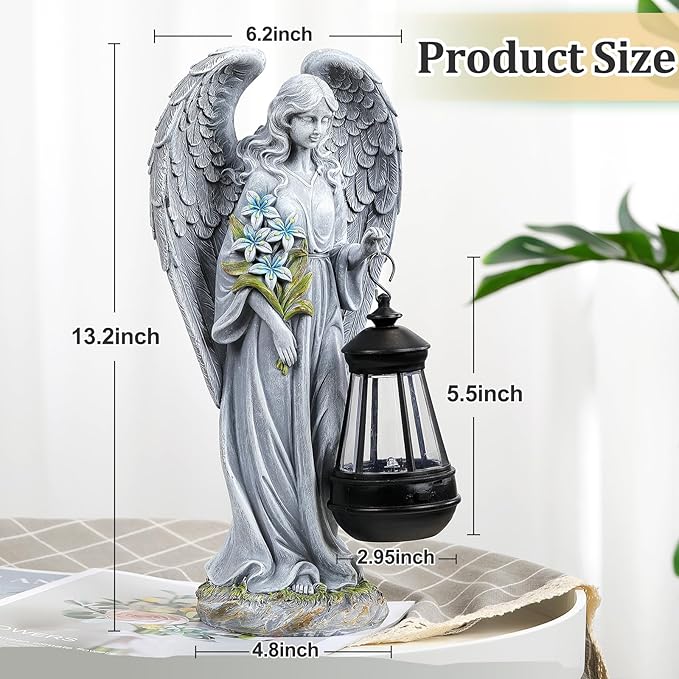 Gray angel garden statue with lantern, full-length view showing wings and flower motif.