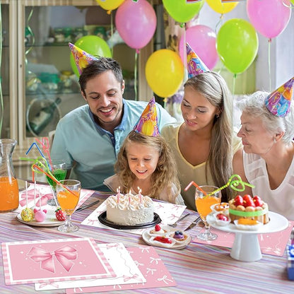 Pink plastic placemat with bow and star pattern on a birthday table