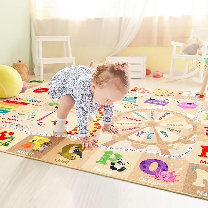 Beige play rug showing animal figures and month labels in a circular learning design.