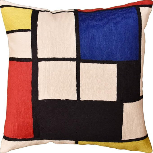 Geometric wool pillow cover with red, blue, yellow, white, and black blocks