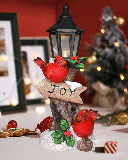 Lighted resin cardinal Christmas ornament with black lantern, two red birds, and JOY sign