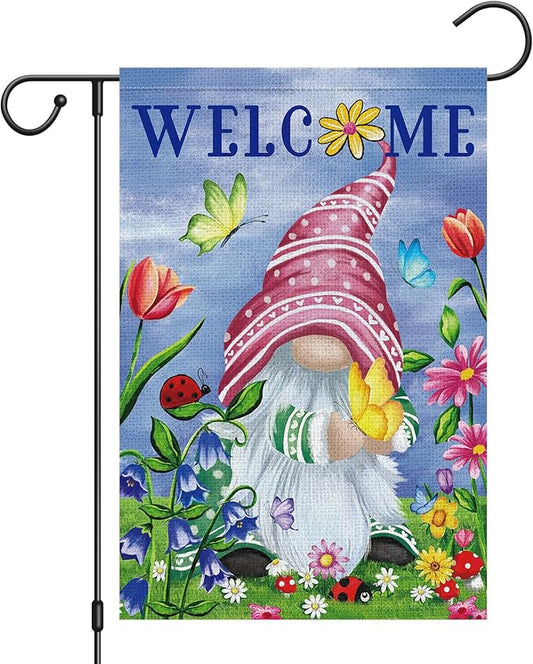 Spring gnome garden flag with WELCOME text, butterflies, tulips, and flowers on blue