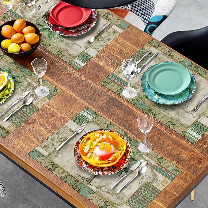 Tropical palm placemats on dining table with brown center and green geometric trim pattern.
