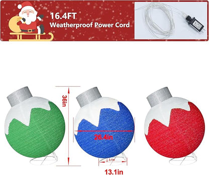 Three illustrated lit globe ornaments in blue, red and green with glitter finish