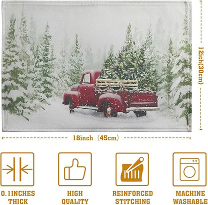 Christmas placemat with red truck and pine trees on snowy white fabric, set of four