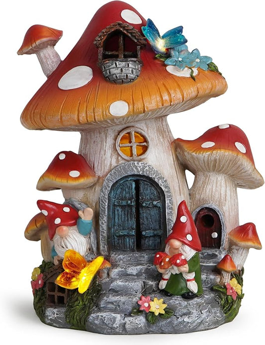 Mushroom house gnome decoration with red-capped mushrooms, blue dragonfly, and tiny gnomes