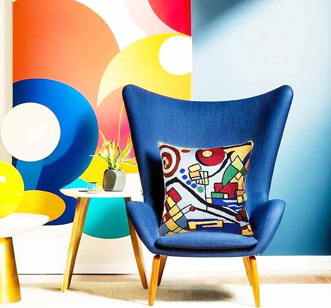 Embroidered abstract geometric pillow cover with multicolor pattern on light fabric