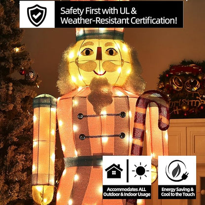 LED-lit nutcracker yard stake with glowing face, red-and-white coat, and orange hat lights