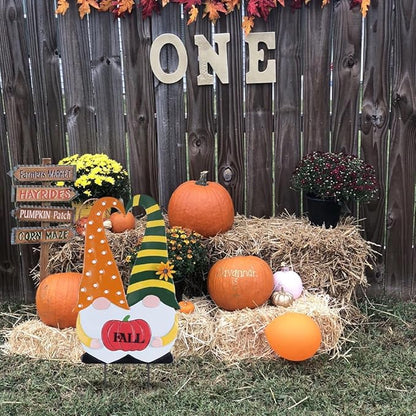 Thanksgiving fall gnome stake with orange polka-dot outfit, green striped hat, and “FALL” pumpkin