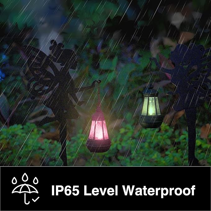 Black metal fairy stake solar lanterns glowing through rainfall for outdoor garden decor