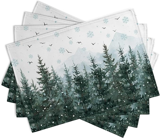 Set of 4 Christmas placemats with pine trees and snowflakes in green and light sky