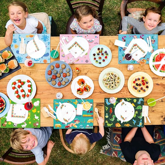 Kids placemats set on a picnic table with colorful animal cartoon designs