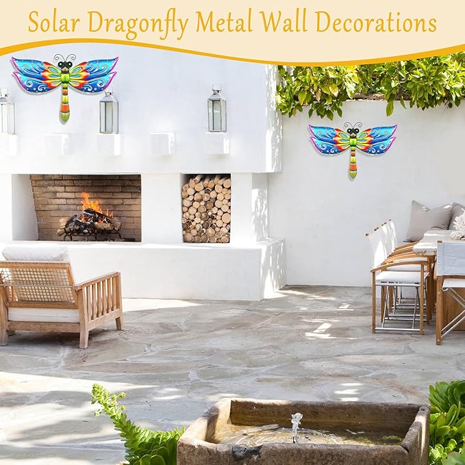 Blue and multicolor metal dragonfly wall decor hanging on an outdoor wall