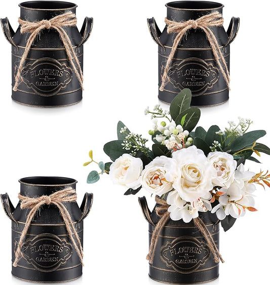 Set of four black metal milk can vases with side handles and rope ties