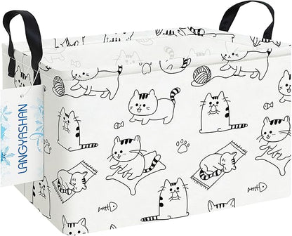White rectangular canvas storage bin with black cat cartoon print and carrying handles