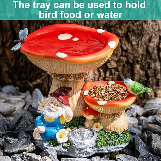 Solar mushroom bird feeder statue with two red tray caps, gnome figure, green bird and basin
