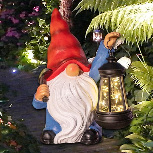 Garden gnome solar light statue holding a black lantern with warm glow