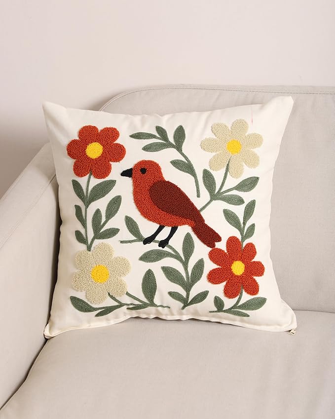 Square bird embroidered pillow cover with red-orange bird and flower sprigs on white