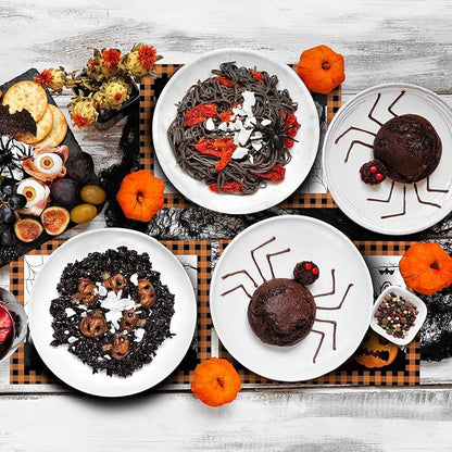 Halloween paper placemat with plaid border and spiderweb jack-o'-lantern illustrations