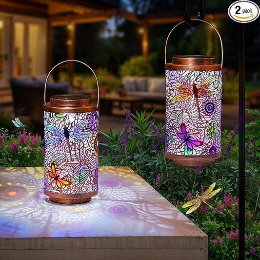 Pair of solar dragonfly lanterns with multicolor cutout glass, copper tops and handles