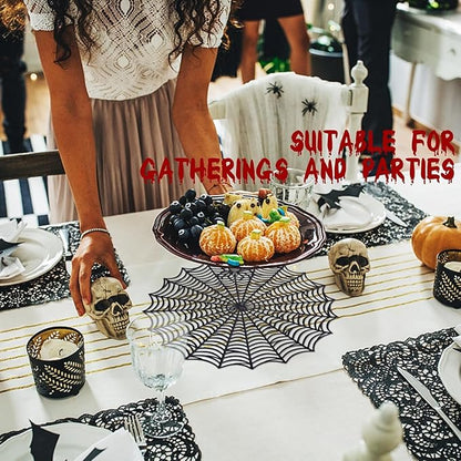 Round black spider web PVC placemat on a table, featuring a central web hub
