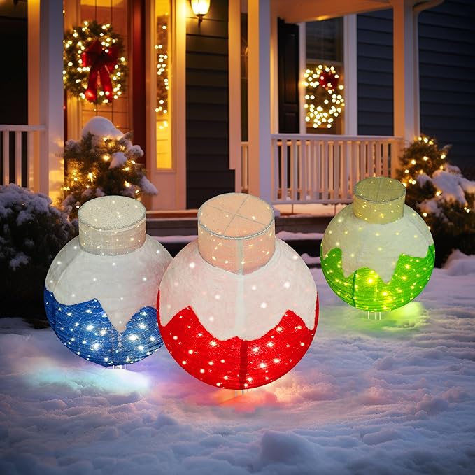 Set of 3 lit pop-up Christmas ball ornaments in blue, red and green with stands