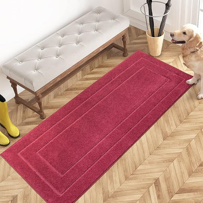 Burgundy red entryway runner rug with rectangular border and low-profile loop pile