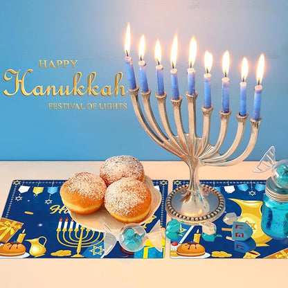 Blue Hanukkah plastic placemat with menorah candles and “Happy Hanukkah” text