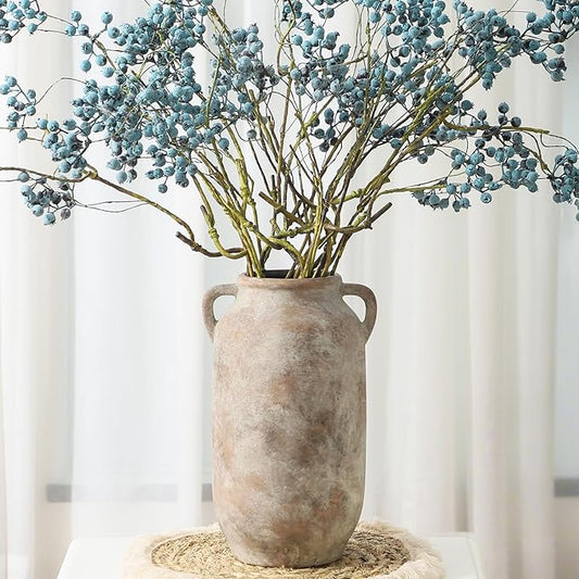 Textured ceramic vase in light gray with two side handles and wide opening.