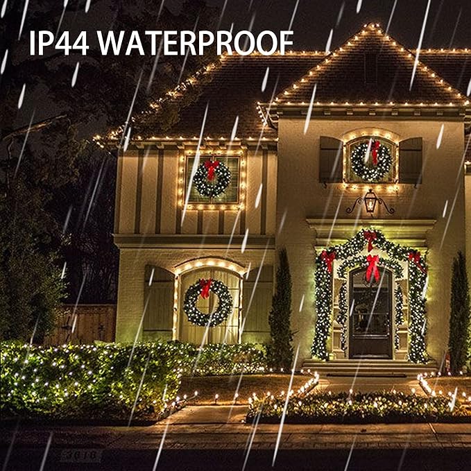 Warm white waterproof outdoor Christmas string lights with glowing bulbs on wiring