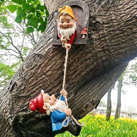 Climbing garden gnome statue hugging a tree face, yellow hat, red outfit, holding rope