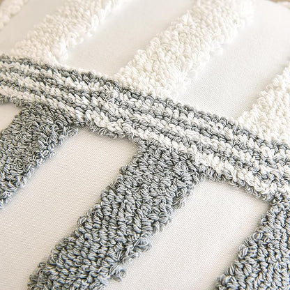 Textured white pillow cover fabric with gray looped tufted cross pattern