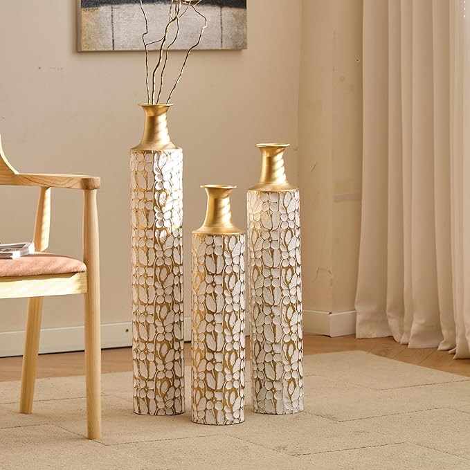 Set of three antique white and gold metal floor vases with twig pattern, tall stems