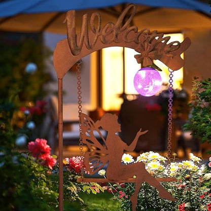 Solar fairy garden light with rust stake, fairy cutout, and glowing purple sphere