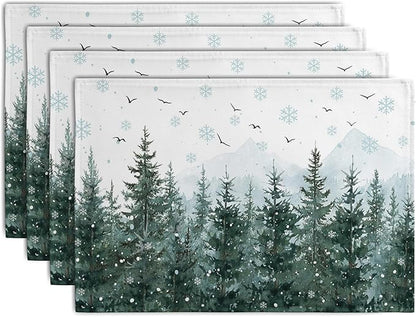 Set of 4 green pine tree snowflake Christmas placemats, snowy forest scene