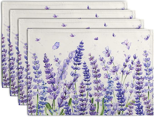 Set of 4 placemats with purple lavender stems and butterflies on ivory fabric.