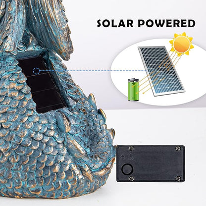 Blue dragon statue beside solar panel and battery box for powered globe light