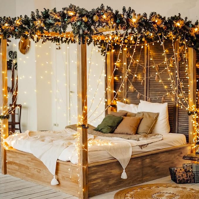 Warm white LED curtain string lights along window and bed area in a bedroom